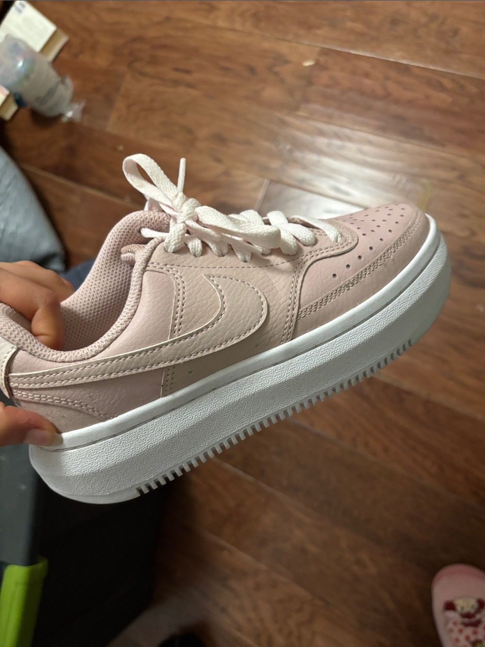 Blush Pink Nike Low-Top Sneaker with White Platform Sole